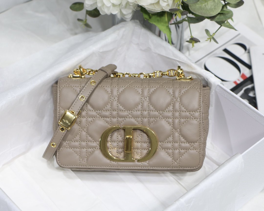 new Edision arrival. The Dior Caro bag is crafted in apricot calfskin and embellished with the signature cannage stitching.