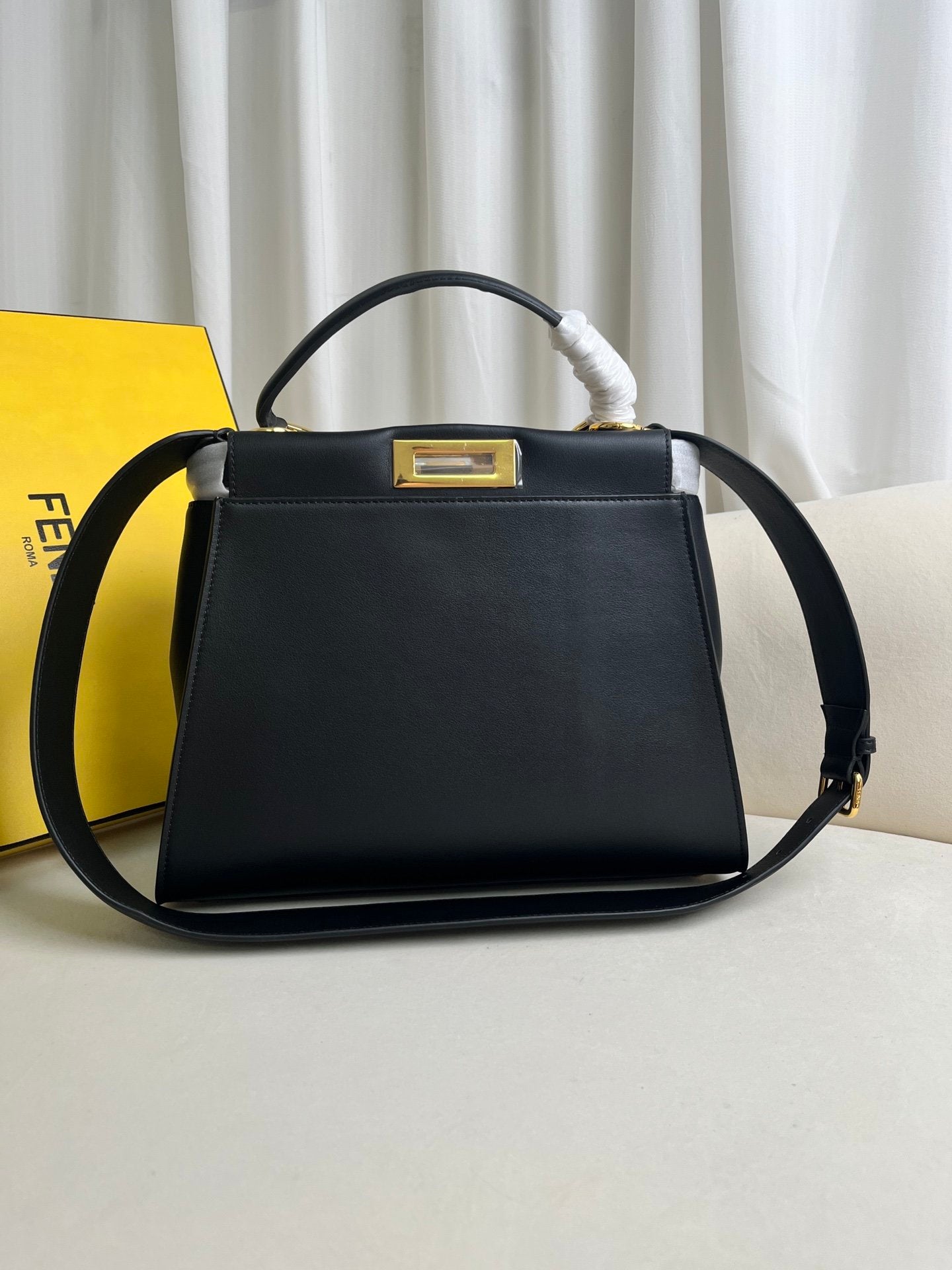 large black Peekaboo ISeeU bag