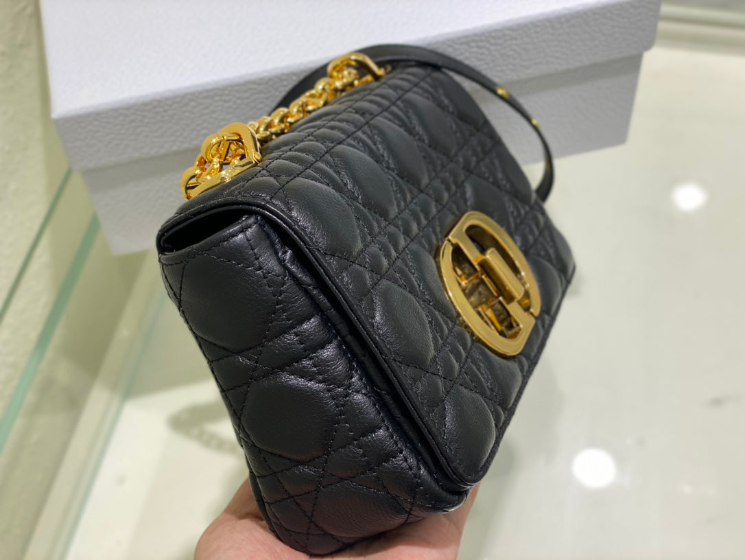 new Edision arrival. The Dior Caro bag is crafted in apricot calfskin and embellished with the signature cannage stitching.