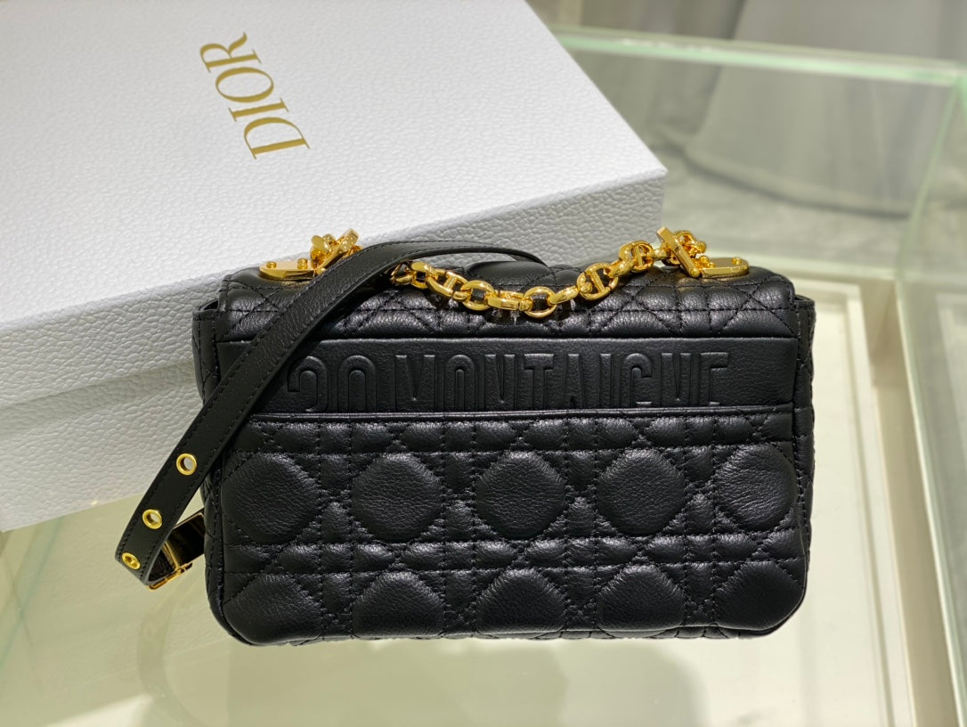 new Edision arrival. The Dior Caro bag is crafted in apricot calfskin and embellished with the signature cannage stitching.