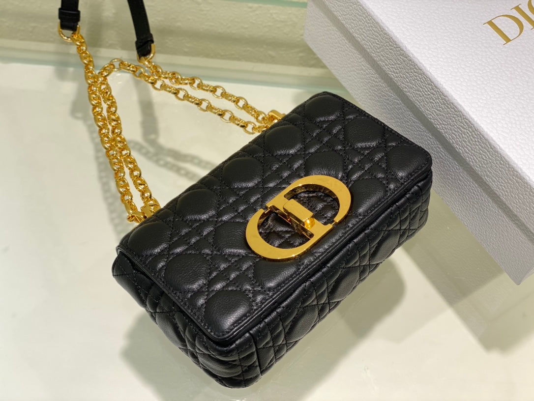 new Edision arrival. The Dior Caro bag is crafted in apricot calfskin and embellished with the signature cannage stitching.