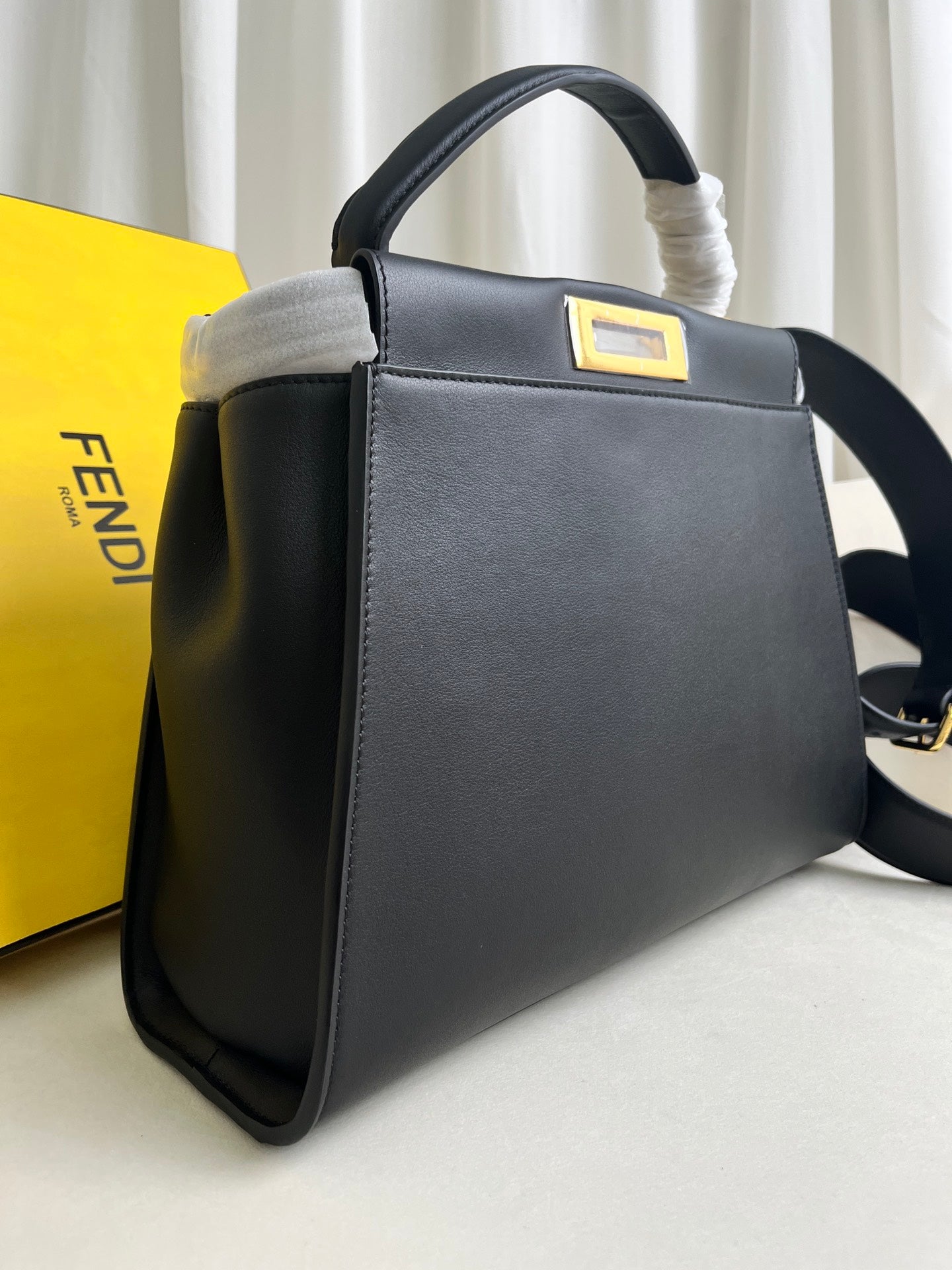 large black Peekaboo ISeeU bag
