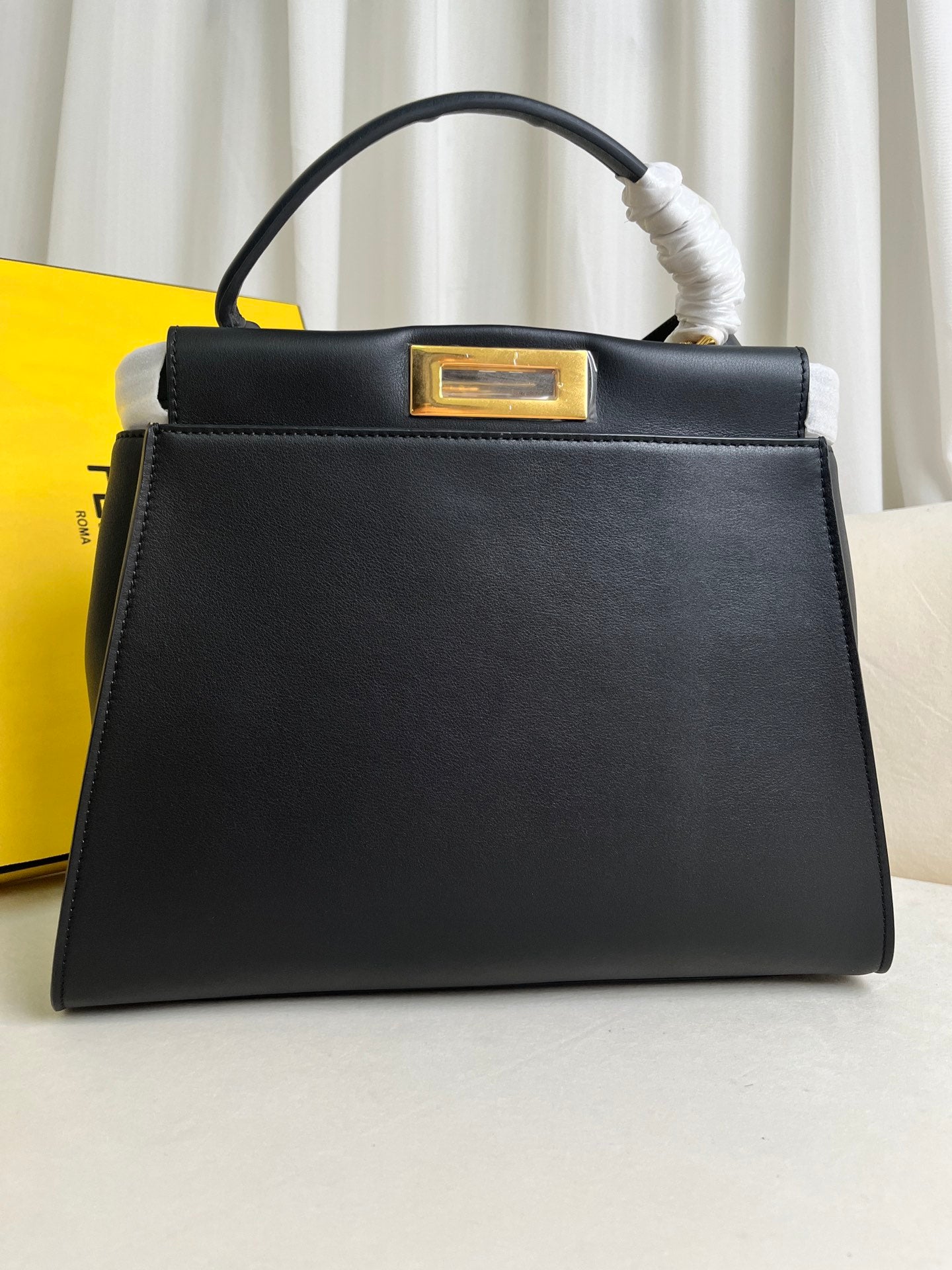 large black Peekaboo ISeeU bag