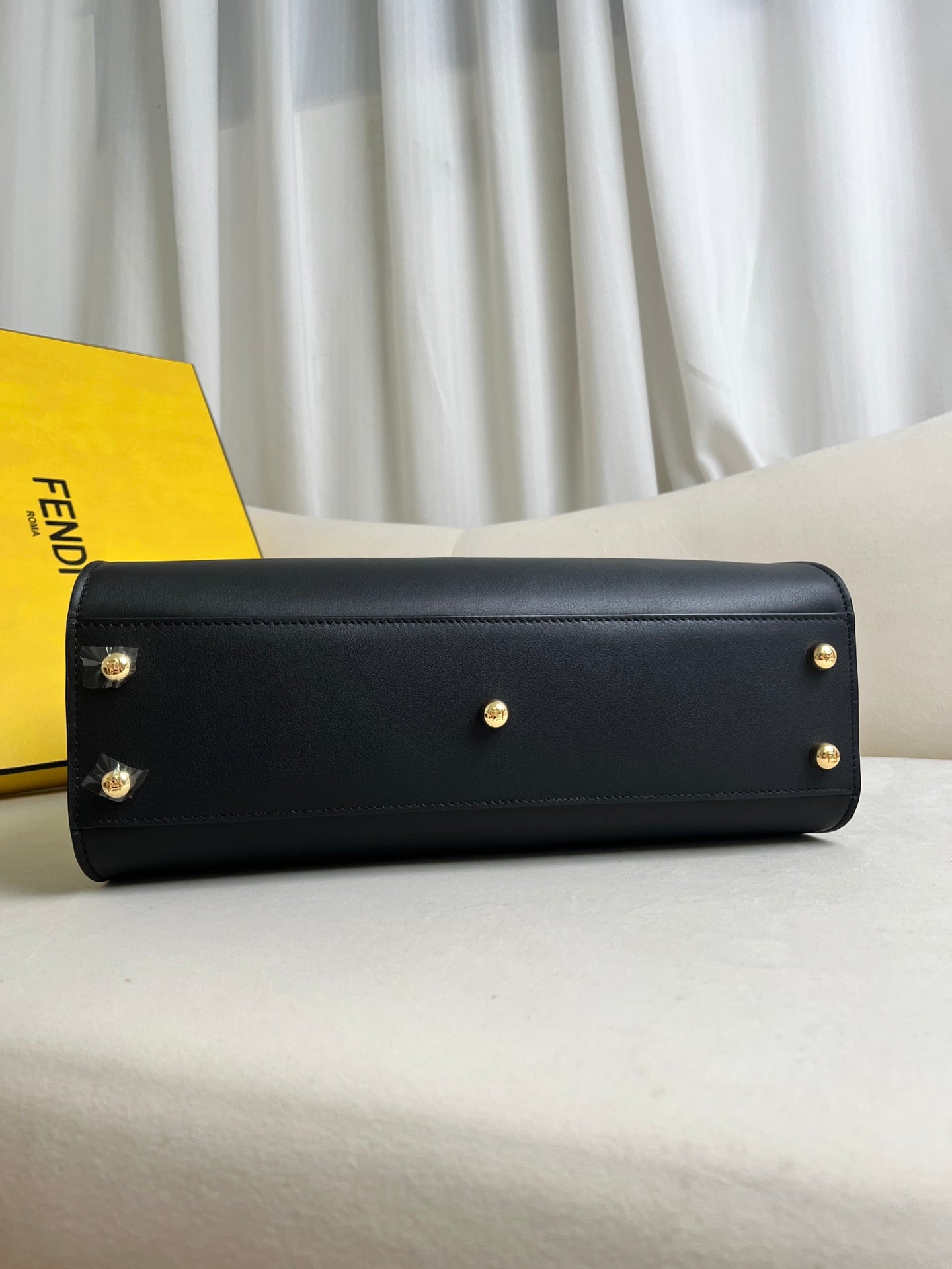 large black Peekaboo ISeeU bag