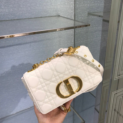 new Edision arrival. The Dior Caro bag is crafted in apricot calfskin and embellished with the signature cannage stitching.