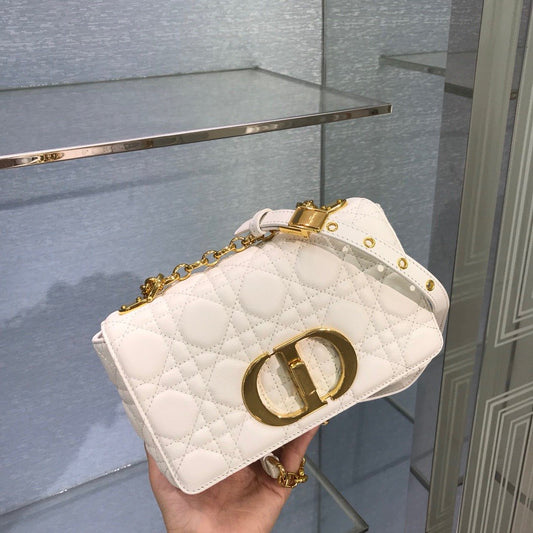 new Edision arrival. The Dior Caro bag is crafted in apricot calfskin and embellished with the signature cannage stitching.
