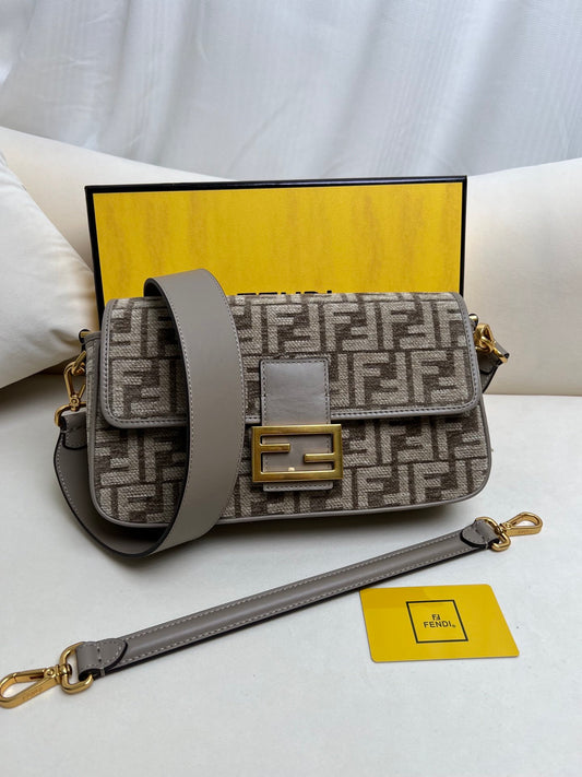 Baguette bag in dark gray FF brocade fabric More Details Iconic Baguette medium bag in chenille with dark gray FF brocade motif.