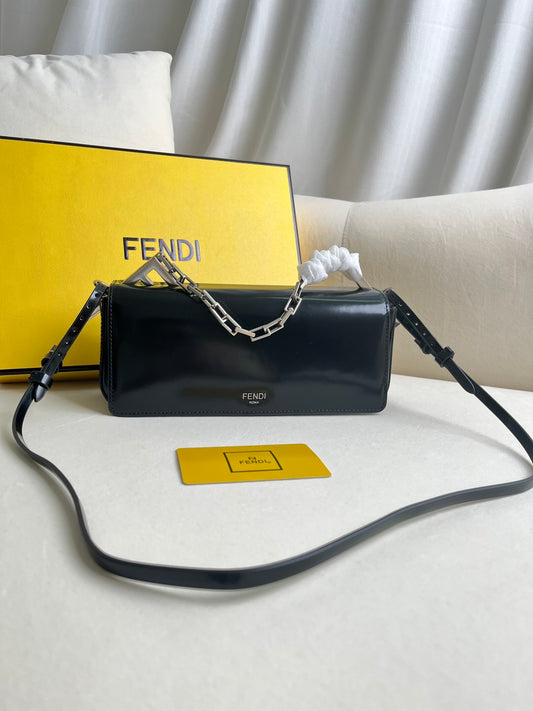 First Sight clutch in smooth calfskin with large F metal hardware and chain