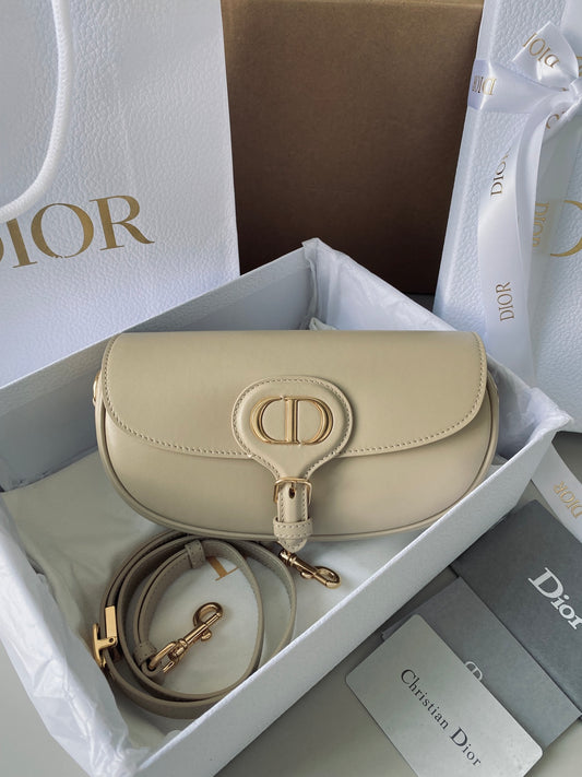 𝗖𝗗 𝗘𝗮𝘀𝘁-𝗪𝗲𝘀𝘁 𝗕𝗼𝗯𝗯𝘆 crescent moon bag