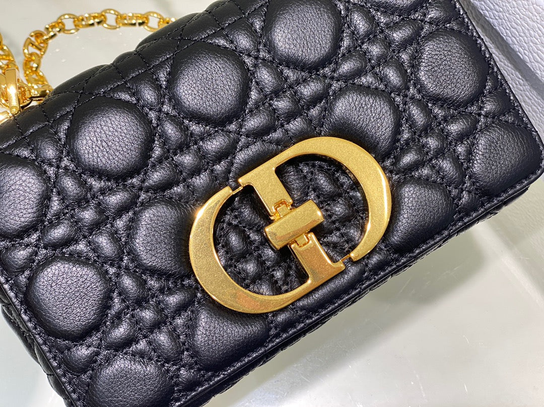 new Edision arrival. The Dior Caro bag is crafted in apricot calfskin and embellished with the signature cannage stitching.