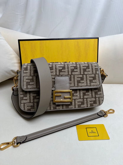Baguette bag in dark gray FF brocade fabric More Details Iconic Baguette medium bag in chenille with dark gray FF brocade motif.