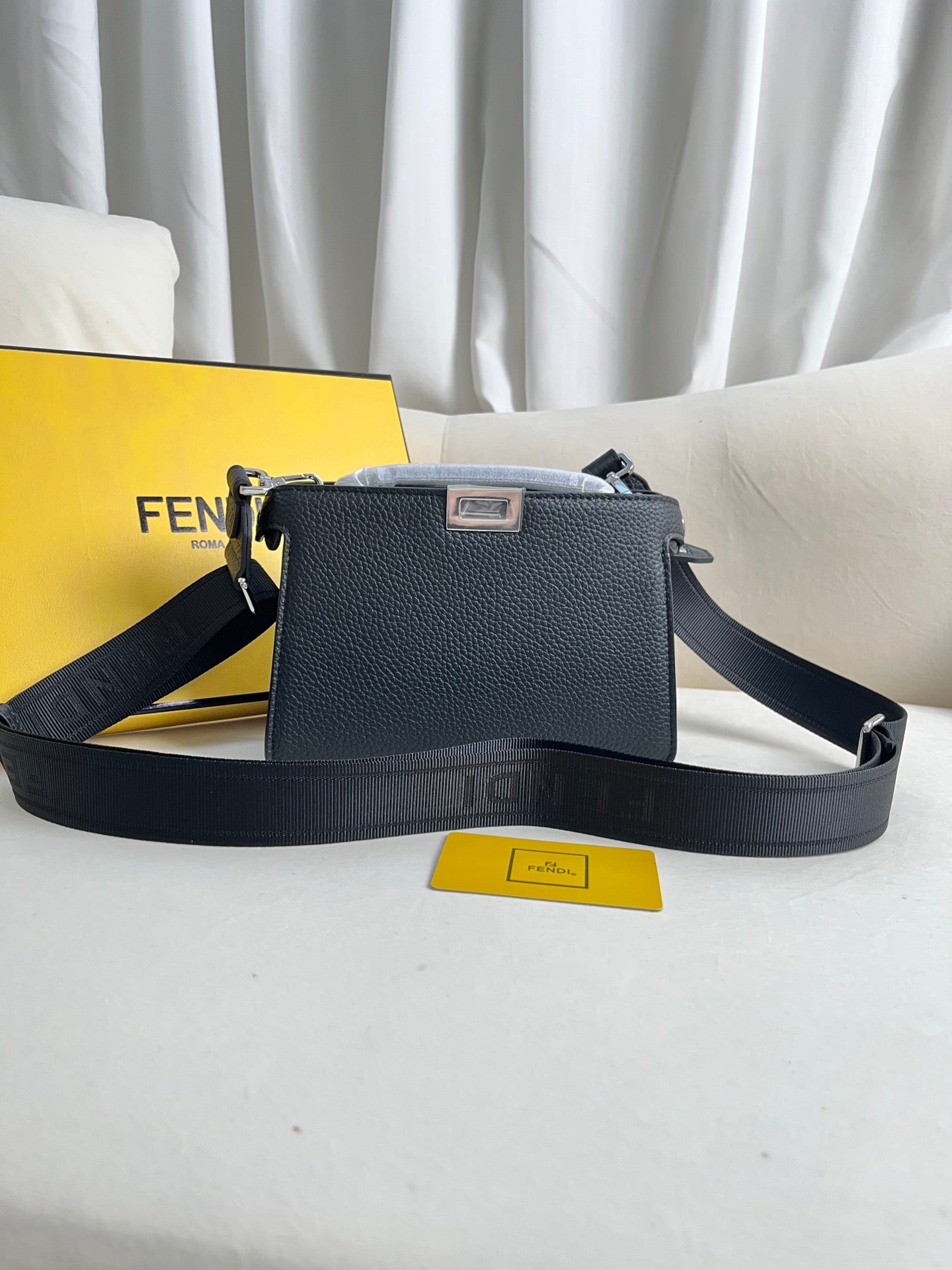 FENDI classic Peekaboo ISeeU XCross handbag in full grain leather.