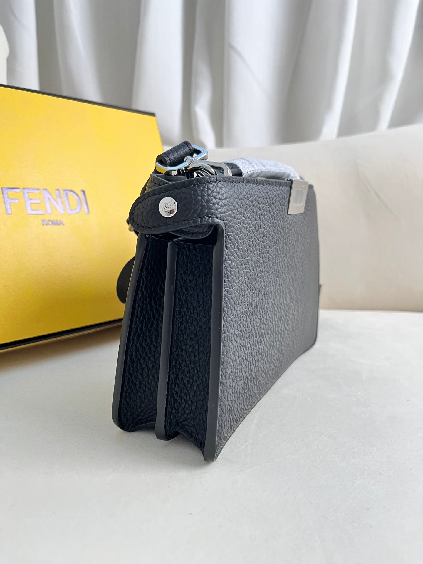 FENDI classic Peekaboo ISeeU XCross handbag in full grain leather.