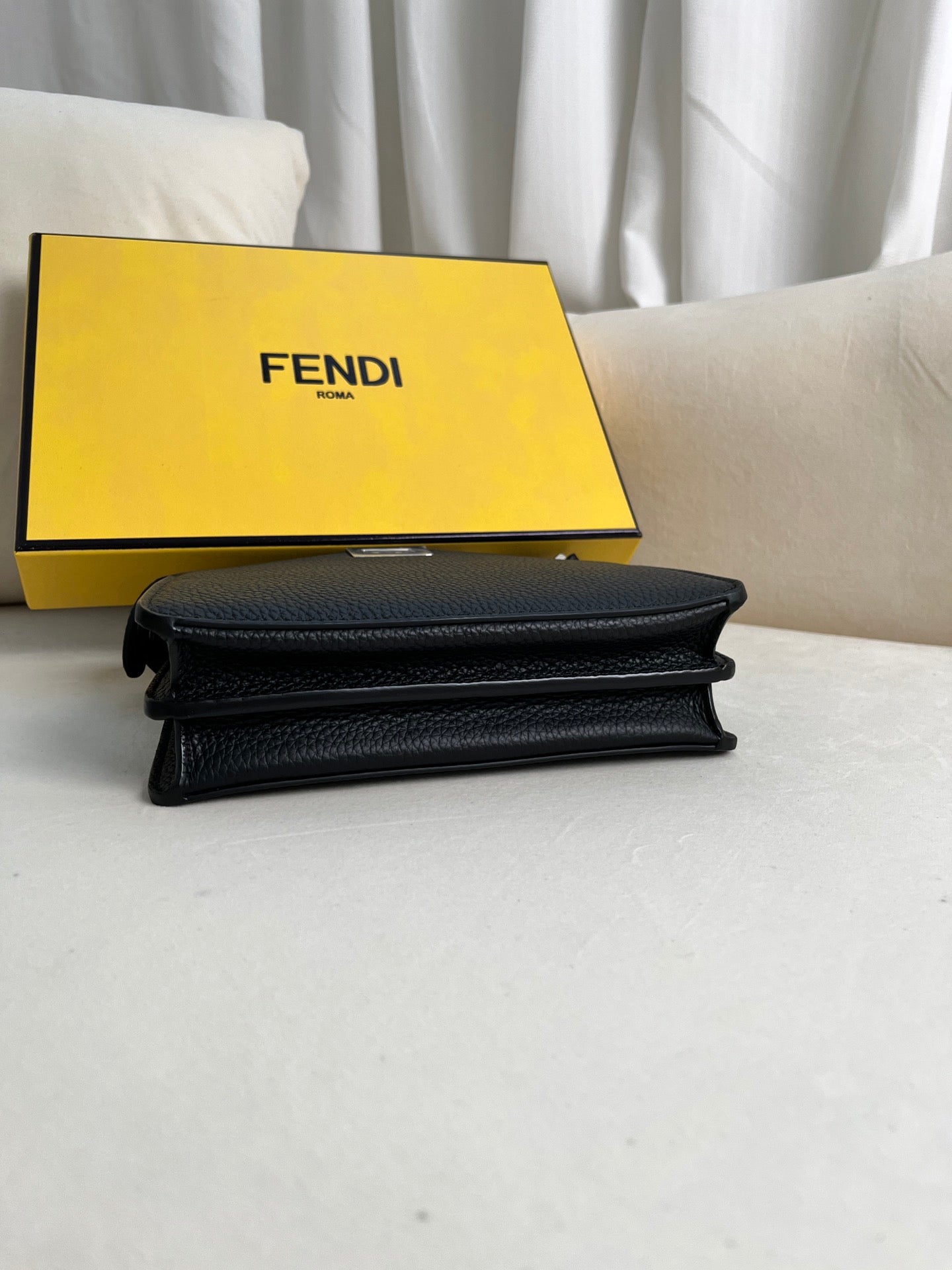 FENDI classic Peekaboo ISeeU XCross handbag in full grain leather.