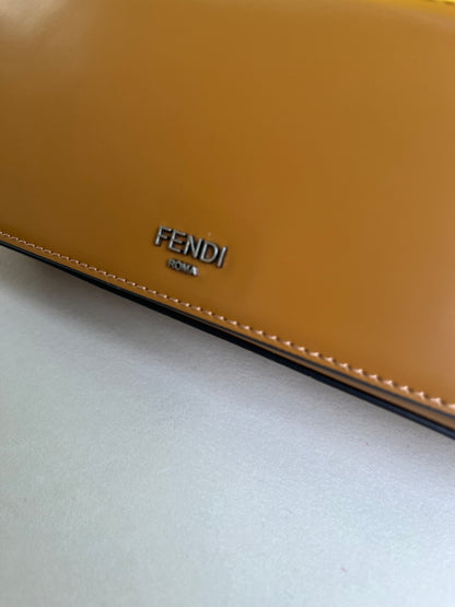 First Sight clutch in smooth calfskin with large F metal hardware and chain