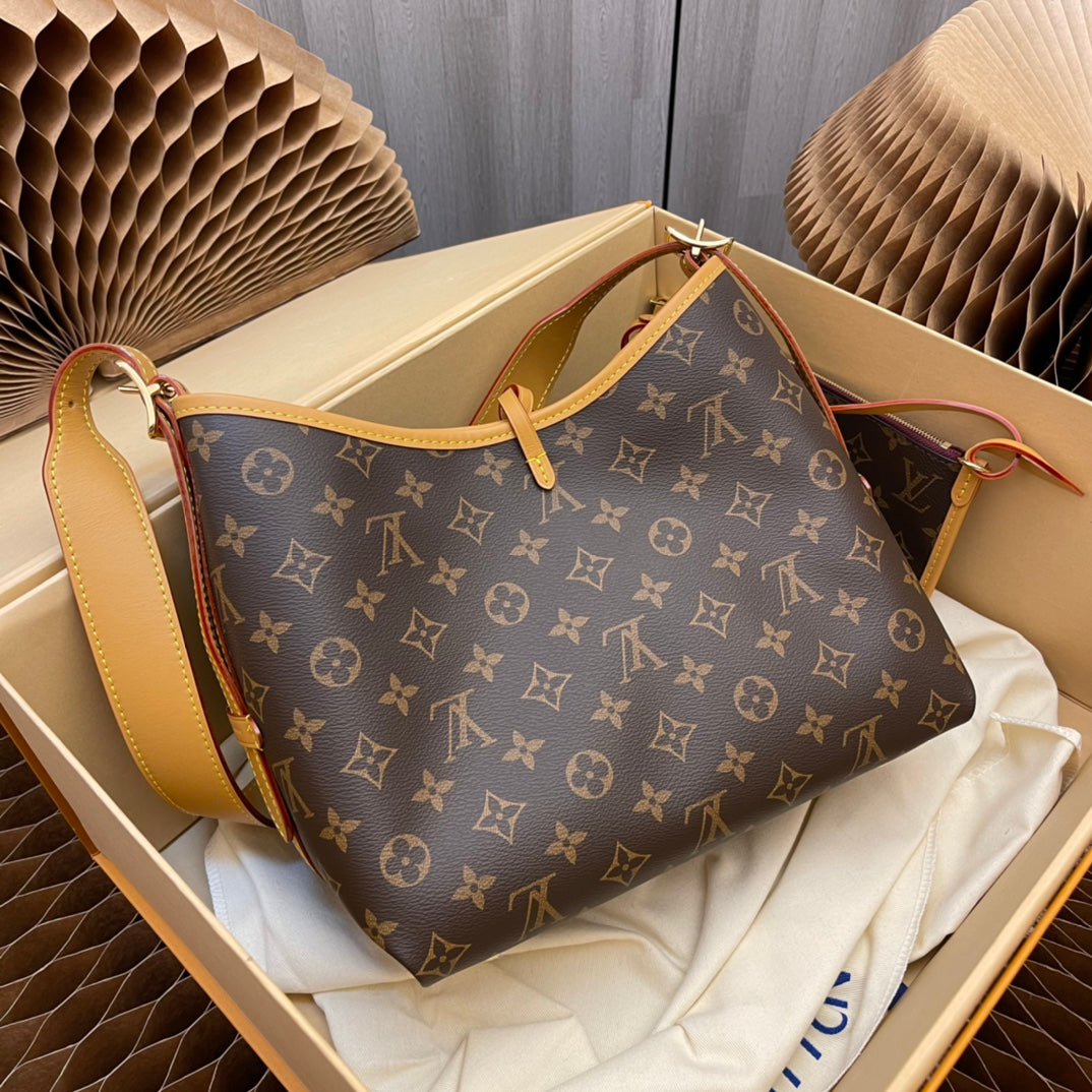 Model number M46203 CarryAll small handbag made of Monogram canvas and leather trim